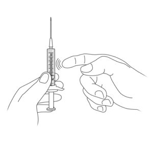 489.Hands that expel air bubbles from a needle syringe.FINAL